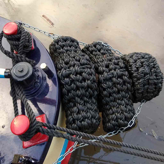 Two Tipcat Fenders and A Short Button Fender On Canal Boat Bosley